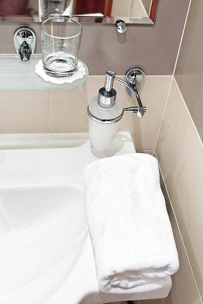 istock White  sink and towell in SPA salon. 175340415