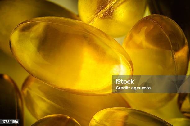 Omega 3 Vitamin D Fish Oil Capsule Stock Photo - Download Image Now - Macrophotography, Vitamin D, Acid