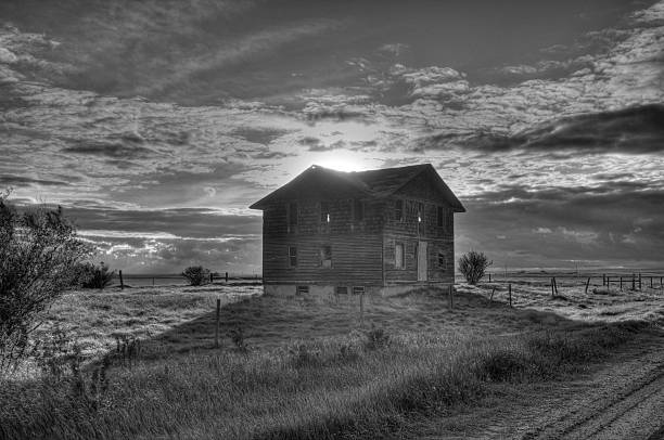 istock Black & White abandoned house with sunset in Robson, Alberta, Canada 175341311