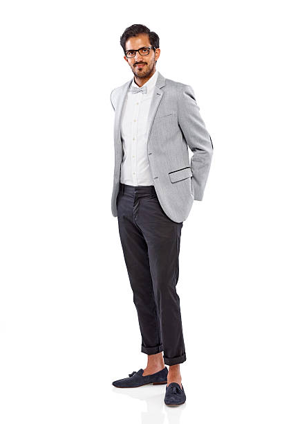 istock Happy young man in suit standing over white 175341514