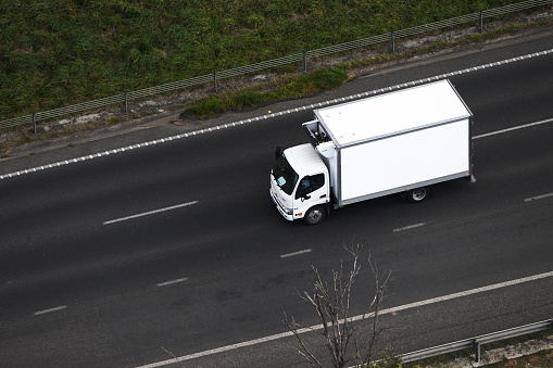 White Van transport in motion in United Kingdom