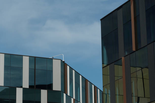 istock Geometric patterns created by glass walls of modern building in office campus 1753423114