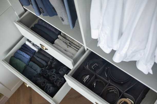 istock Man cupboard clothes storage organization neatly folded belt underwear shirt and socks 1753447949