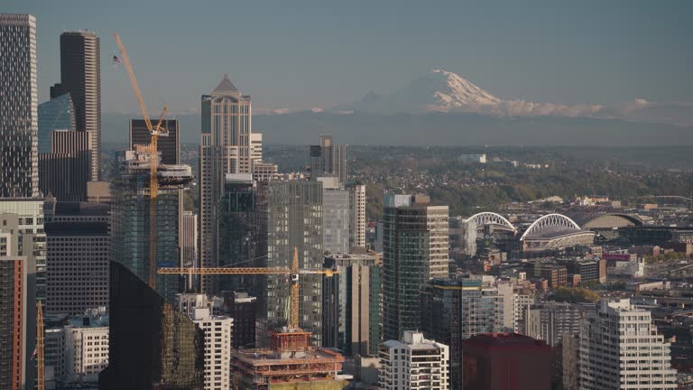 Seattle Washington Cityscape Skyline Skyscrapers and Mount Rainier on Background during Sunset