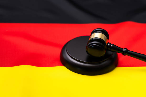 istock Wooden gavel on German flag 1753456164