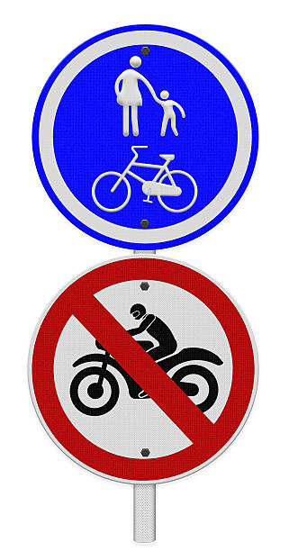 istock Bicycle and pedestrian lane road sign on pole post 175345960