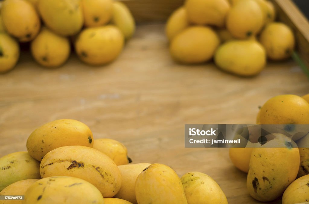 delicious ripe mangoes delicious yellow ripe mangoes in tray Haiti Stock Photo
