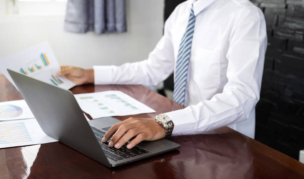 istock Businessmen bookkeeper hand use laptop analysis the graph for Setting challenging business goals and ready to achieve target at home office 1753478494