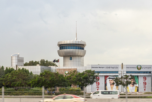 Dubai, United Arab Emirates, March 21, 2023 : View from the window of a tourist bus of the Civil Defence Emirates Martyrs Station of the Dubai city, United Arab Emirates