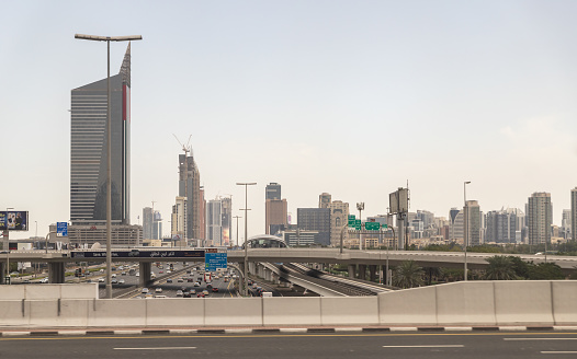 Dubai, United Arab Emirates, March 21, 2023 : View from the window of a tourist bus on the architecture of the Dubai city, United Arab Emirates