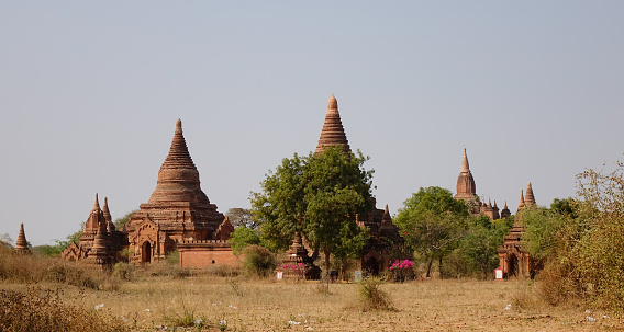 Landscape of Buddhist temples at sunny day in Bagan, Myanmar. Bagan is an ancient city in central Myanmar (formerly Burma), southwest of Mandalay.