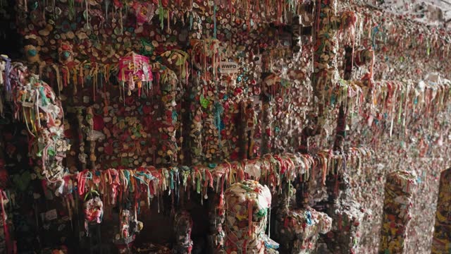The Gum Wall - a Brick Wall Covered in Used Chewing Gum under Pike Place Market in Downtown Seattle, Washington, United States
