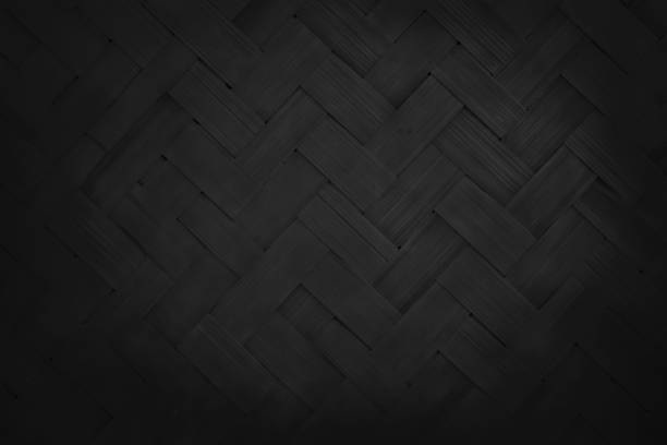 istock Black bamboo weaving pattern, old woven rattan mat texture for background and design art work. 1753525428
