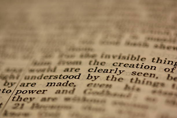 Clearly Seen A closeup of Romans 1:20 (King James Version) with a shallow depth of field, showing the words "Clearly Seen" in sharp focus. methodist stock pictures, royalty-free photos & images