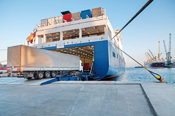 Shipping and Trucking Transportation - RO-RO Transport (Roll On/Roll Off) Shipping and Trucking Transportation - RO-RO Transport (Roll On/Roll Off) ferry photos stock pictures, royalty-free photos & images
