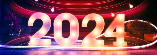 istock New Year 2024 - Celebration - Abstract Defocused Lights. Beautiful Panoramic web banner 1753550882
