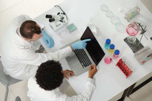 istock Chemists Discussing Research Results 1753583950