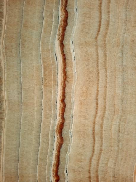 istock Vein line texture onyx marble yellow cream  brown 1753587197