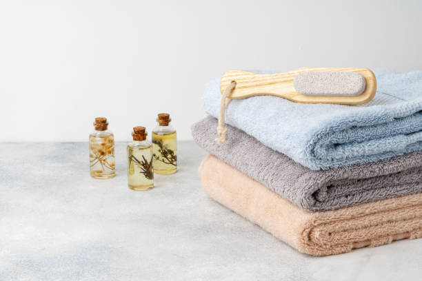 istock Organic essential aroma oil with herbs and towels, spa concept 1753592151