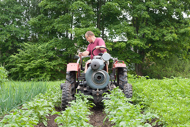 tractor speeding past a car