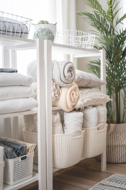 istock Wardrobe in the bedroom with neatly folded linen vertical storage and stacks. 1753607553