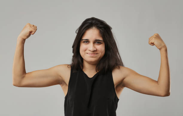 istock Strength displayed, tousled hair, sleeveless attire, genuine exp 1753626749