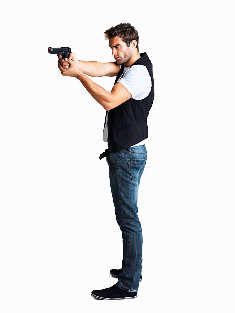 Checking Revolver Rounds 32,700+ Man With Revolver Stock Photos, Pictures & Royalty-Free Images ...