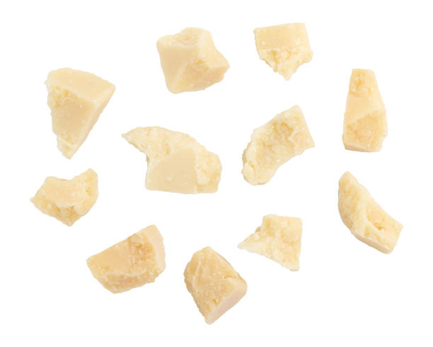 istock pieces of parmesan cheese isolated on white 1753637895