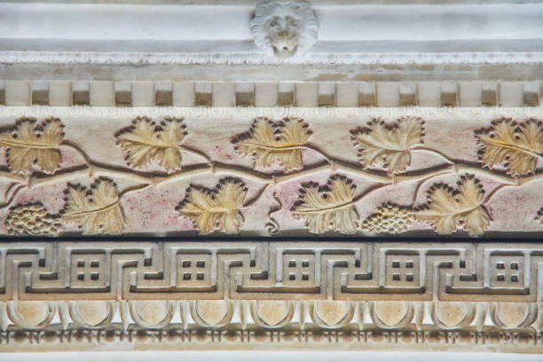graceful beautiful historical bas-reliefs on the facade of the building