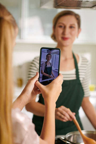 istock Girl Filming Short Cooking Video 1753654683