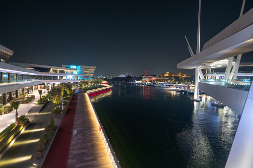 Night view of Al Qana waterfront development in Abu Dhabi a vibrant and diverse entertainment and leisure destination situated on the banks of Khor Al Maqta