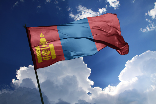 3d illustration flag of Mongolia. Mongolia flag isolated on the blue sky with clipping path.