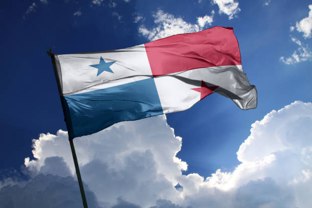 national flag of Panama waving in the wind on a clear day. 3d illustration flag of Panama. Panama flag isolated on the blue sky with clipping path. 3d panama flag stock pictures, royalty-free photos & images