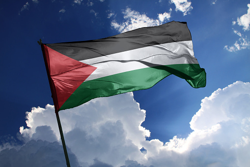 3d illustration flag of Palestine. Palestine flag isolated on the blue sky with clipping path.