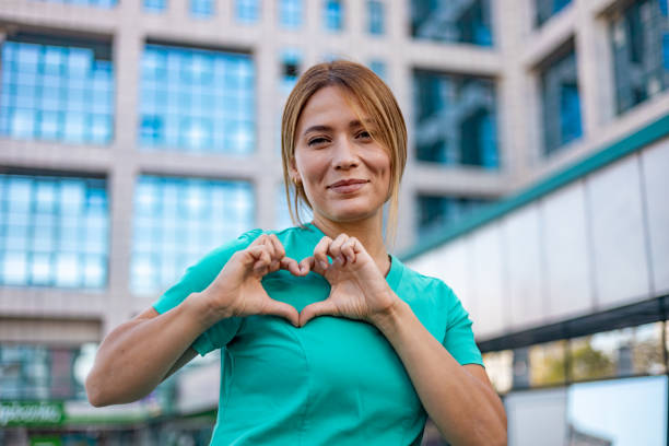 istock Nurse showing heart shape with hands 1753687024