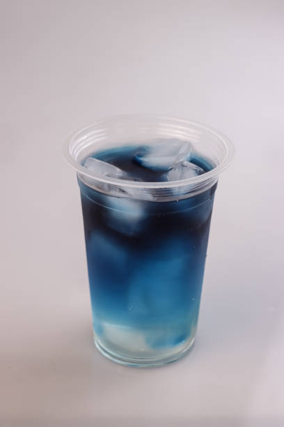 istock Es Teh Bunga Telang or Butterfly Pea Flower Tea Ice Isolated On White. 1753687562