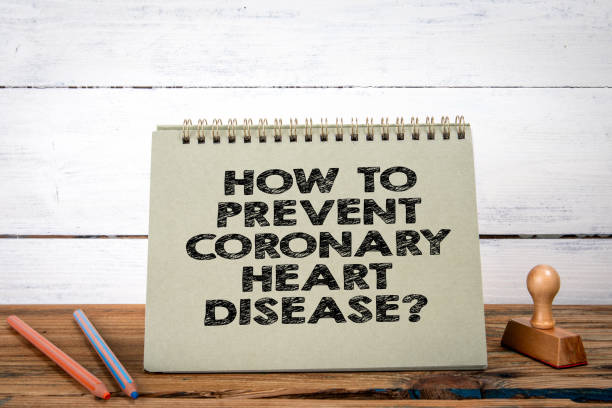 istock How to Prevent Coronary Heart Disease? Green notepad on wooden texture table and white background 1753720953