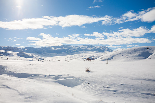 Scenic views of snowy mountains.