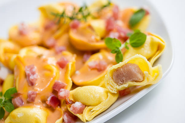 istock fresh tortellini in light sauce with ham 175372717