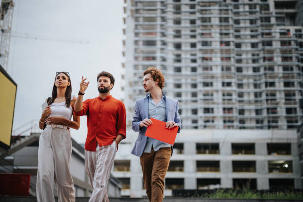 istock Successful Urban Project: Architects and Engineers Discussing Sustainable Design and Project Details 1753729455