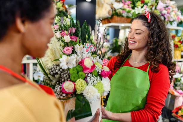 istock Two woman working in flower shop 1753746984