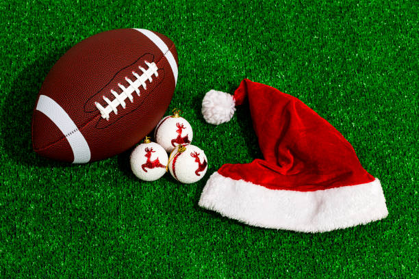 istock Football ball next to Christmas items 1753759313