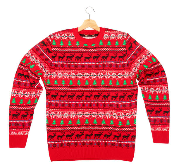 Christmas jumper with hanger lay on white background stock photo