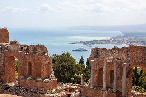 The ancient theatre of Taormina is an ancient Greek theatre in Taormina, Sicily, built in the third century BC, though remodelled by the Romans in 2nd century AD.  Today, the theatre is used as a venue for the annual arts festival Taormina Arte.