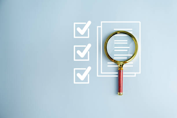 istock Magnifying glass on gray background. correct or check E-Document inspection. Business industry quality control. Subject approval and contract assignment. 1753787705
