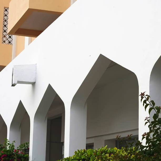 istock White Facade, Arabic architecture, arches and plants 1753802736