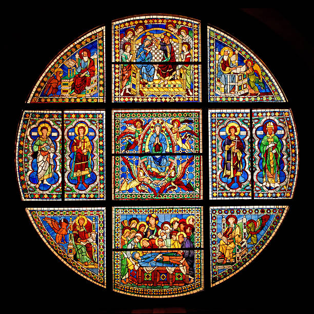 Stained Glass Window at Siena Cathedral "Stained Glass Window ( diameter: 700 cm) at Siena Cathedral, Siena, Italy. Designed by Duccio and Cimbaue. Showing the Death, Assumption and Coronation of the Virgin. c.1287-88. This is the oldest and the most important surviving example of Italian stained glass." saint stock pictures, royalty-free photos & images