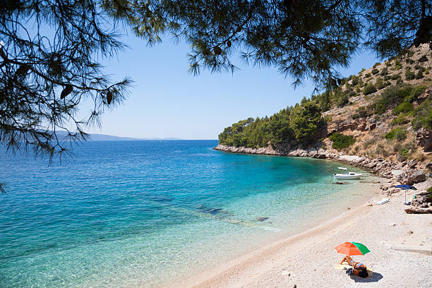 istock Coloured parasol in awesome seascape, Croatia 175380848