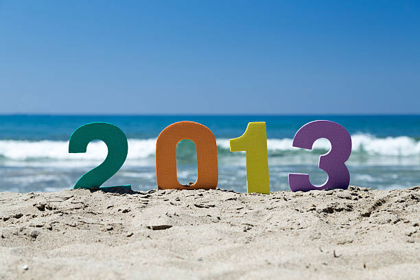 roku 2013 r - 2013 beach sand new years eve zdjęcia i obrazy z banku zdjęć