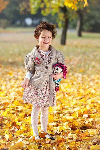 Photo of Girl with doll